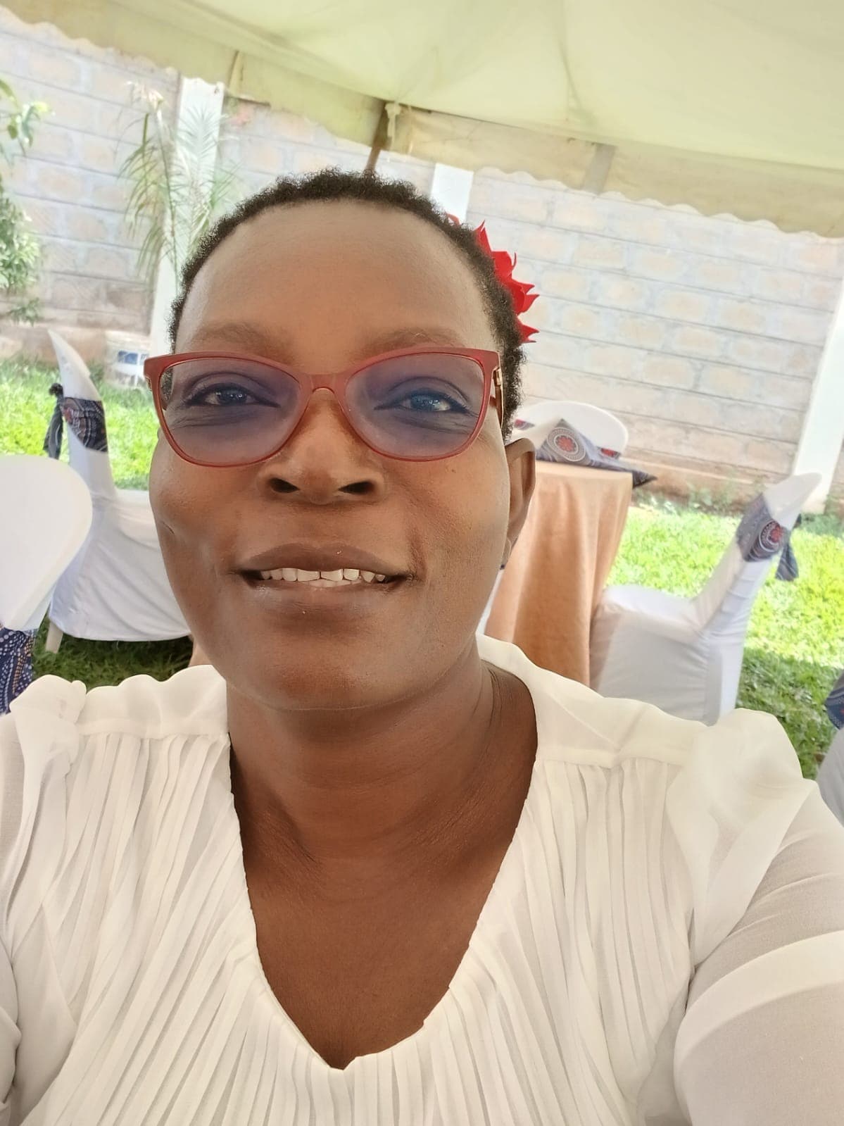 Portrait of Ms. Frida Adhiambo Okeyo of CHAKE.